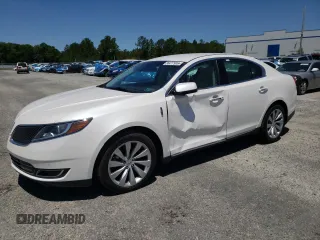 2015 Lincoln MKS z VIN 1LNHL9EK1FG606203, wystawiony jako Copart lot #56477905 z przebiegiem 38 339 mil mil oraz Szkoda całkowita • Salvage title. Historia ofert i sprzedaży dostępna na DreamBid. Obrazek 1.
