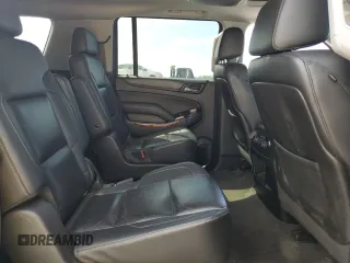 2015 Chevrolet Suburban LTZ with VIN 1GNSCKKC9FR151532, listed as a Copart auction lot 54209315 with 122,380 mi miles and Salvage title. Bid and sale history available at DreamBid. Image 11.