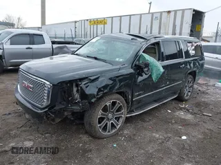2016 GMC Yukon XL Denali with VIN 1GKS2HKJ8GR406450, listed as a IAAI auction lot 41661050 with 125,830 mi miles. Bid and sale history available at carsss.com. Image 18.