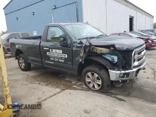 2015 Ford F-150 XL with VIN 1FTNF1EG1FKD00398, listed as a Copart auction lot 72774054 with 164,052 mi miles and Salvage title. Bid and sale history available at DreamBid. Image 4.