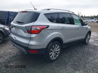 2017 Ford Escape Titanium with VIN 1FMCU9J97HUE98023, listed as a IAAI auction lot 41745843 with 24,857 mi miles. Bid and sale history available at carsss.com. Image 4.