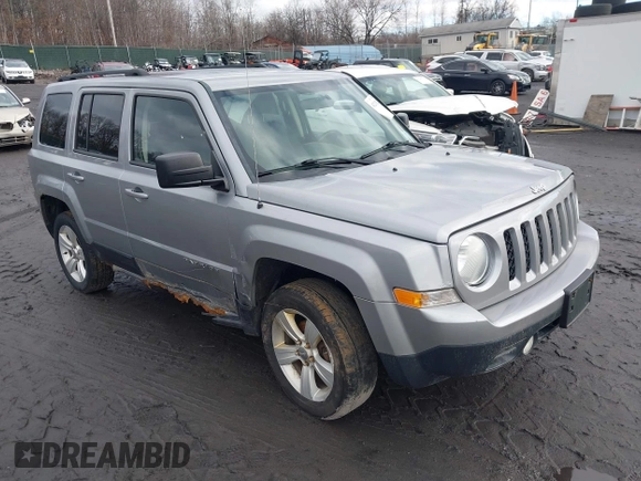 2014 Jeep Patriot Latitude with VIN 1C4NJRFB6ED778433, listed as a IAAI auction lot 41211522 with 127,506 mi miles. Bid and sale history available at carsss.com. Image 1.
