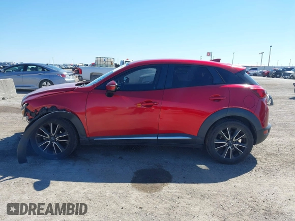 2016 Mazda CX-3 Grand Touring with VIN JM1DKBD71G0112329, listed as a IAAI auction lot 41662610 with 145,329 mi miles. Bid and sale history available at carsss.com. Image 14.