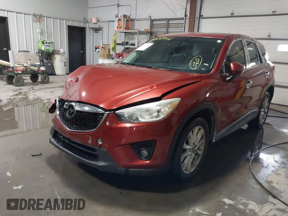 2013 Mazda CX-5 Grand Touring with VIN JM3KE2DE3D0120609, listed as a IAAI auction lot 41527942 with 215,176 mi miles. Bid and sale history available at carsss.com. Image 2.