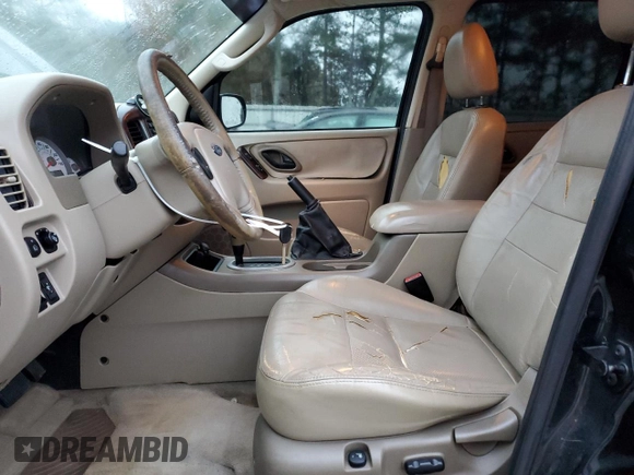 2006 Ford Escape Limited with VIN 1FMCU04136KA77782, listed as a Copart auction lot 82420994 with 198,770 mi miles and Salvage Title. Bid and sale history available at carsss.com. Image 7.