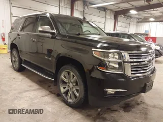 2015 Chevrolet Tahoe LTZ z VIN 1GNSKCKC6FR634369, wystawiony jako IAAI lot #42181442 z przebiegiem 148 226 mil mil oraz . Historia ofert i sprzedaży dostępna na DreamBid. Obrazek 1.