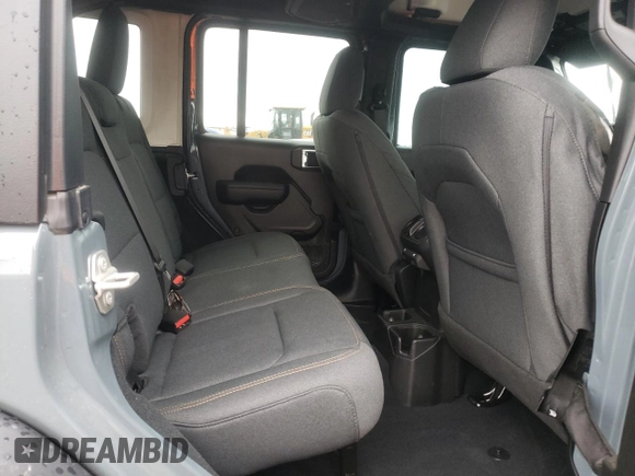 2024 Jeep Wrangler Sport S with VIN 1C4PJXDG1RW305304, listed as a Copart auction lot 57555635 with 5,705 mi miles and Salvage title. Bid and sale history available at DreamBid. Image 11.