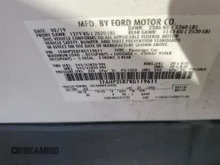 2019 Ford Taurus SEL with VIN 1FAHP2E87KG119611, listed as a Copart auction lot 48609095 with 68,966 mi miles and Salvage Title. Bid and sale history available at DreamBid. Image 13.