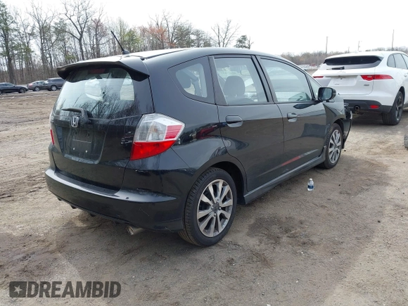 2013 Honda Fit Sport with VIN JHMGE8H59DC046377, listed as a IAAI auction lot 41921693 with 89,704 mi miles. Bid and sale history available at carsss.com. Image 4.