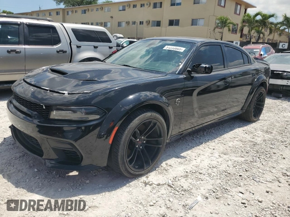 2021 Dodge Charger SRT Hellcat Widebody z VIN 2C3CDXL93MH660916, wystawiony jako Copart lot #51233805 z przebiegiem 27 729 mil mil oraz Czysty tytuł • Clean title. Historia ofert i sprzedaży dostępna na DreamBid. Obrazek 1.