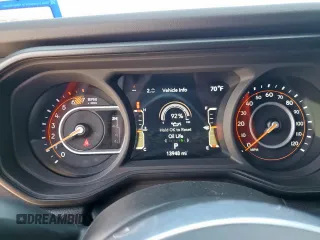 2024 Jeep Wrangler Sahara with VIN 1C4PJXEN6RW106911, listed as a Copart auction lot 58937945 with 13,948 mi miles and Salvage title. Bid and sale history available at DreamBid. Image 9.