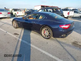 2008 Maserati GranTurismo with VIN ZAMGJ45A680041406, listed as a IAAI auction lot 41230930 with 59,518 mi miles. Bid and sale history available at carsss.com. Image 3.
