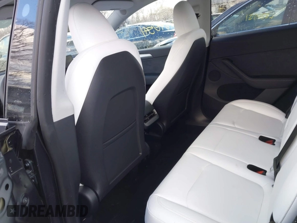 2024 Tesla Model Y Long Range with VIN 7SAYGDEE0RA300064, listed as a IAAI auction lot 41640541 with 5,049 mi miles and . Bid and sale history available at DreamBid. Image 8.