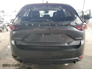 2020 Mazda CX-5 Touring with VIN JM3KFACM6L0797748, listed as a Copart auction lot 44573645 with 104,094 mi miles and Salvage Title. Bid and sale history available at carsss.com. Image 6.
