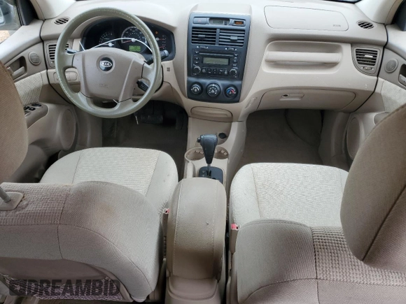 2006 Kia Sportage LX z VIN KNDJF724467145179, wystawiony jako Copart lot #41755105 z przebiegiem 250 252 mil mil oraz Szkoda całkowita • Salvage title. Historia ofert i sprzedaży dostępna na DreamBid. Obrazek 8.