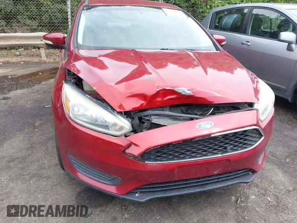 2015 Ford Focus SE with VIN 1FADP3F22FL259223, listed as a IAAI auction lot 42333439 with 77,111 mi miles and . Bid and sale history available at DreamBid. Image 6.