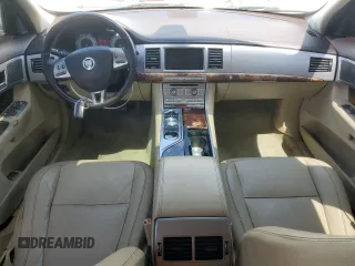 2011 Jaguar XF with VIN SAJWA0FB6BLR86959, listed as a Copart auction lot 52579385 with 110,087 mi miles and Salvage Title. Bid and sale history available at carsss.com. Image 8.