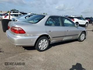 1999 Honda Accord LX z VIN 1HGCG5645XA103050, wystawiony jako Copart lot #65796435 z przebiegiem 148 828 mil mil oraz Czysty tytuł • Clean title. Historia ofert i sprzedaży dostępna na DreamBid. Obrazek 3.