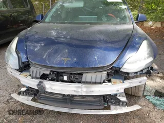 2018 Tesla Model 3 Long Range Battery with VIN 5YJ3E1EA2JF040914, listed as a IAAI auction lot 42120091 with 138,130 mi miles and . Bid and sale history available at DreamBid. Image 18.