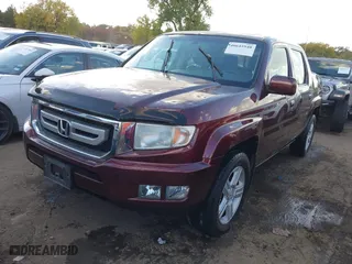 2009 Honda Ridgeline RTL with VIN 5FPYK16549B103496, listed as a IAAI auction lot 40645940 with 168,132 mi miles. Bid and sale history available at carsss.com. Image 17.