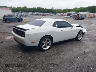 2015 Dodge Challenger SXT with VIN 2C3CDZAG2FH701634, listed as a IAAI auction lot 42242521 with 153,379 mi miles and . Bid and sale history available at DreamBid. Image 4.