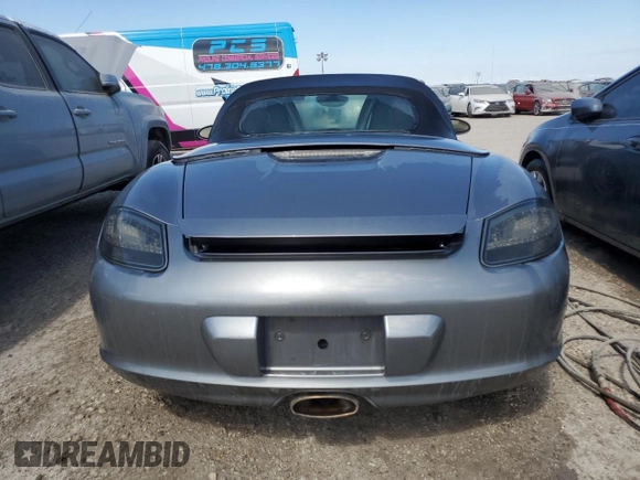2005 Porsche Boxster с VIN WP0CA29875U711919, выставлен на аукционе Copart как лот 74299934 с пробегом Не указан миль и На запчасти • Non repairable. История ставок и продаж доступна на DreamBid. Изображение 6.