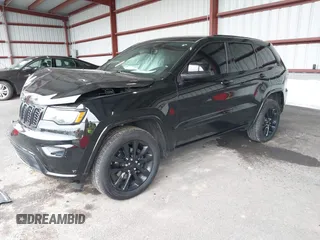 2019 Jeep Grand Cherokee Laredo E with VIN 1C4RJFAG0KC565739, listed as a IAAI auction lot 42039038 with 103,358 mi miles and . Bid and sale history available at DreamBid. Image 17.