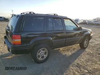 1998 Jeep Grand Cherokee Limited with VIN 1J4GZ78Y9WC322919, listed as a Copart auction lot 73225994 with 171,474 mi miles and Salvage Title. Bid and sale history available at carsss.com. Image 3.