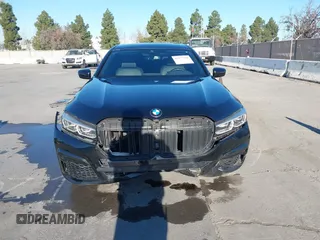 2022 BMW 7 Series 740i with VIN WBA7T2C02NCJ33925, listed as a IAAI auction lot 41377788 with 143,684 mi miles and . Bid and sale history available at carsss.com. Image 12.