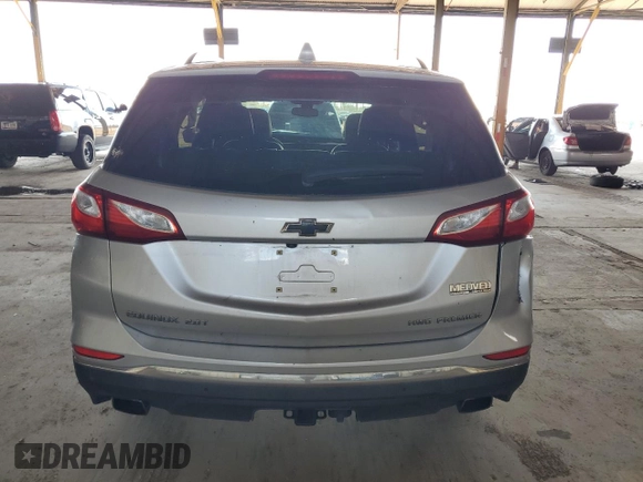 2019 Chevrolet Equinox Premier z VIN 3GNAXYEX3KS592663, wystawiony jako Copart lot #59635385 z przebiegiem 70 575 mil mil oraz Szkoda całkowita • Salvage title. Historia ofert i sprzedaży dostępna na DreamBid. Obrazek 6.
