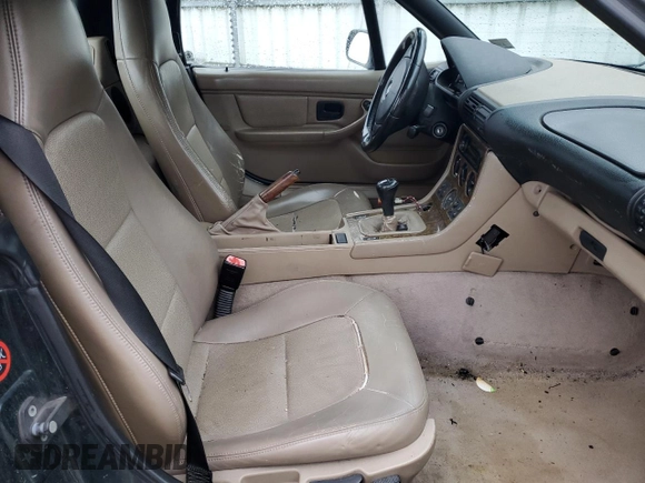 2000 BMW Z3 2.8 z VIN 4USCH3341YLF43502, wystawiony jako Copart lot #44773415 z przebiegiem 168 390 mil mil oraz Szkoda całkowita • Salvage title. Historia ofert i sprzedaży dostępna na DreamBid. Obrazek 10.