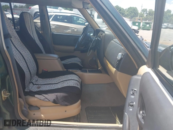 2000 Jeep Cherokee z VIN 1J4FT48S7YL134491, wystawiony jako IAAI lot #42789305 z przebiegiem 180 886 mil mil oraz . Historia ofert i sprzedaży dostępna na DreamBid. Obrazek 5.