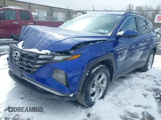 2022 Hyundai Tucson SEL with VIN 5NMJBCAE5NH086584, listed as a IAAI auction lot 41976975 with 22,011 mi miles. Bid and sale history available at carsss.com. Image 2.