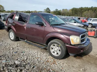 2004 Dodge Durango SLT with VIN 1D4HD48N64F138811, listed as a Copart auction lot 50614995 with 247,452 mi miles and Salvage title. Bid and sale history available at DreamBid. Image 4.