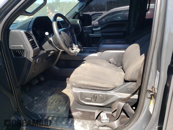 2017 Ford F-150 XL with VIN 1FTEW1CGXHKD42803, listed as a Copart auction lot 52357785 with 129,309 mi miles and Salvage title. Bid and sale history available at DreamBid. Image 7.