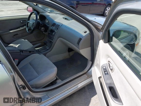 2003 Nissan Maxima SE with VIN JN1DA31D33T513282, listed as a IAAI auction lot 42289710 with 343,973 mi miles and . Bid and sale history available at DreamBid. Image 5.