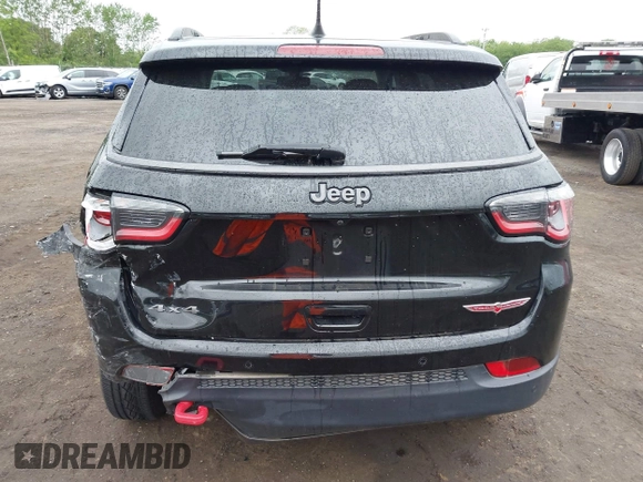 2019 Jeep Compass Trailhawk with VIN 3C4NJDDB7KT727762, listed as a IAAI auction lot 42299260 with 56,733 mi miles and . Bid and sale history available at DreamBid. Image 17.