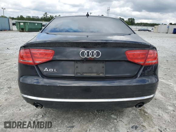 2014 Audi A8 3.0T z VIN WAURGAFD5EN007035, wystawiony jako Copart lot #58578545 z przebiegiem 199 696 mil mil oraz Tytuł czysty. Historia ofert i sprzedaży dostępna na DreamBid. Obrazek 6.