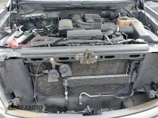 2010 Ford F-150 XL with VIN 1FTFW1EV1AFD48049, listed as a Copart auction lot 58571135 with 189,439 mi miles and Salvage title. Bid and sale history available at DreamBid. Image 11.