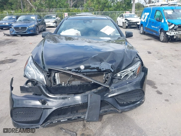 2017 Mercedes-Benz E-Class E 400 with VIN WDDKJ6HBXHF353634, listed as a IAAI auction lot 41203314 with 106,531 mi miles. Bid and sale history available at carsss.com. Image 13.