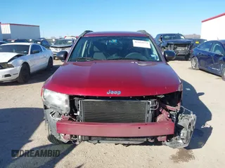 2014 Jeep Compass Sport with VIN 1C4NJCBA3ED812435, listed as a IAAI auction lot 41424374 with 174,663 mi miles and . Bid and sale history available at DreamBid. Image 13.