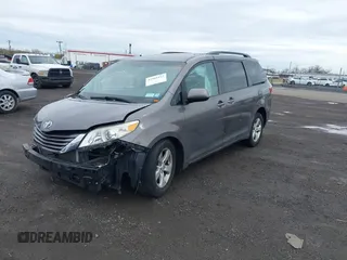 2015 Toyota Sienna LE AAS with VIN 5TDKK3DC1FS615090, listed as a IAAI auction lot 41965112 with 116,745 mi miles. Bid and sale history available at carsss.com. Image 17.