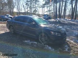 2017 Volkswagen Passat R-Line w/Comfort Pkg with VIN 1VWDT7A39HC015811, listed as a IAAI auction lot 41609160 with 104,919 mi miles. Bid and sale history available at carsss.com. Image 1.