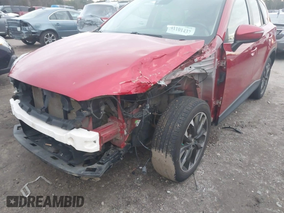 2016 Mazda CX-5 Grand Touring with VIN JM3KE4DY6G0740347, listed as a IAAI auction lot 41101437 with 81,586 mi miles. Bid and sale history available at carsss.com. Image 18.