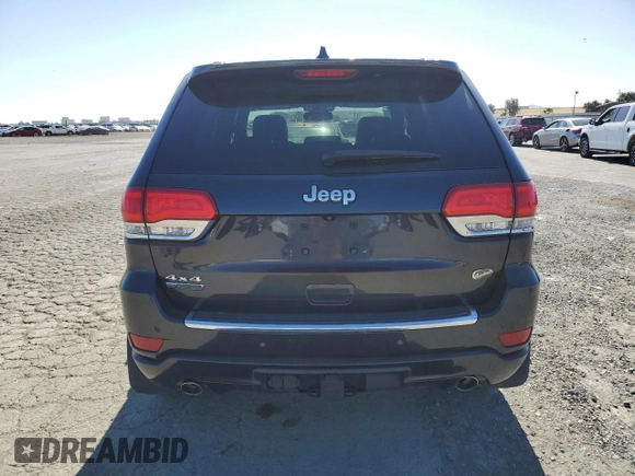 2015 Jeep Grand Cherokee Overland with VIN 1C4RJFCM3FC887817, listed as a Copart auction lot 57420185 with 145,971 mi miles and Clean title. Bid and sale history available at DreamBid. Image 6.