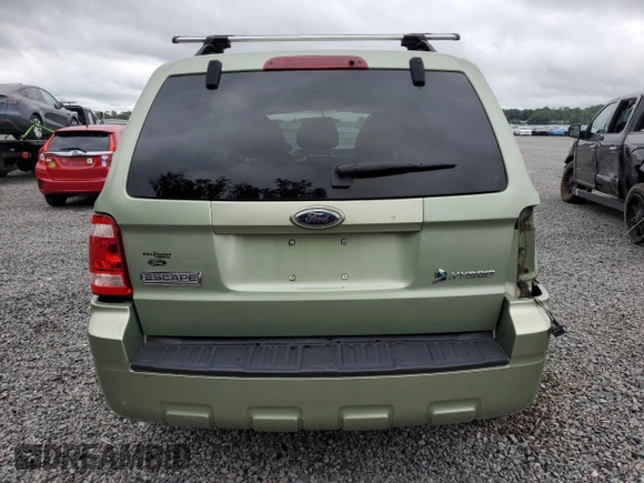 2009 Ford Escape Hybrid с VIN 1FMCU49339KC39089, выставлен на аукционе Copart как лот 56947025 с пробегом 145 098 миль миль и На запчасти • Non repairable. История ставок и продаж доступна на DreamBid. Изображение 6.