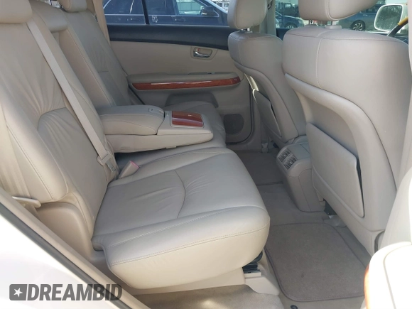 2007 Lexus RX 400h z VIN JTJGW31U472002782, wystawiony jako IAAI lot #41763035 z przebiegiem 228 650 mil mil oraz . Historia ofert i sprzedaży dostępna na DreamBid. Obrazek 8.
