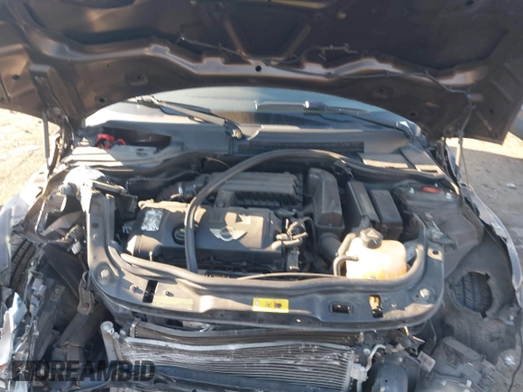 2011 MINI Convertible with VIN WMWZN3C55BT133367, listed as a IAAI auction lot 41781374 with 124,036 mi miles and . Bid and sale history available at DreamBid. Image 10.
