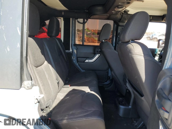 2015 Jeep Wrangler Unlimited Sahara with VIN 1C4BJWEGXFL624846, listed as a Copart auction lot 47949535 with 125,710 mi miles and Salvage Title. Bid and sale history available at carsss.com. Image 11.
