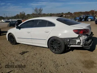 2014 Volkswagen CC R-Line with VIN WVWBP7AN2EE503420, listed as a Copart auction lot 77744894 with 99,679 mi miles and Salvage Title. Bid and sale history available at carsss.com. Image 2.